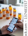 Photorealistic close-up of a person using a digital pharmacy app on their smartphone to refill a prescription, with orange pill bottles labeled with patient information in the background on a white 137481557