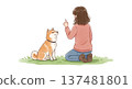 Woman teaching dog tricks 137481801