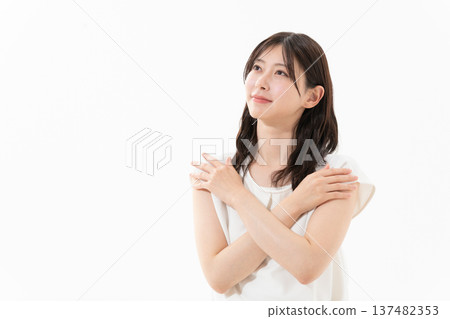 Beauty image of a woman doing skin care on a white background Beauty image of a woman doing skin care on a white background 137482353