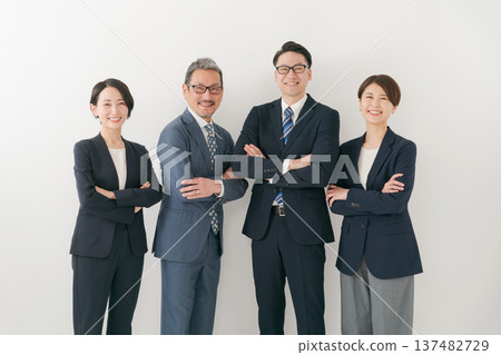 Businessmen with arms folded Businessmen with arms folded 137482729