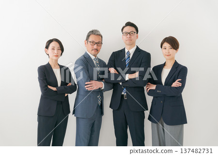 Businessmen with arms folded Businessmen with arms folded 137482731