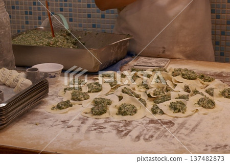 Making Taiwanese dumplings: Handmade dumplings and dumpling fillings in the making Making Taiwanese dumplings: Handmade dumplings and dumpling fillings in the making 137482873