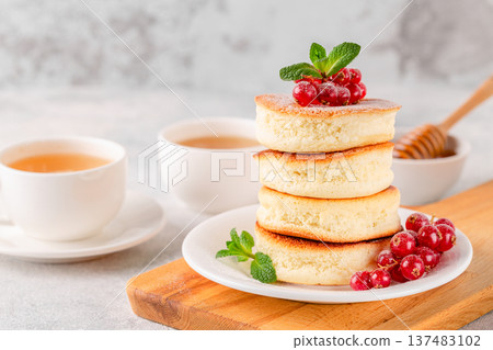 Japanese soft pancakes with berries Japanese soft pancakes with berries 137483102