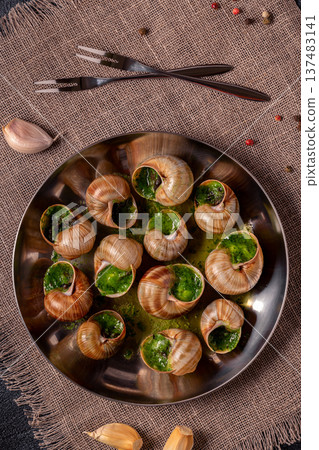 Bourgogne Escargot Snails with herb garlic oil. Bourgogne Escargot Snails with herb garlic oil. 137483141