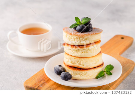 Japanese soft pancakes with berries 137483182