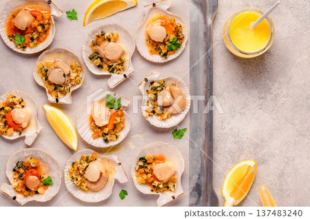 Cooked scallops with sauce Cooked scallops with sauce 137483240