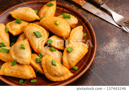 Dumplings, filled with mashed potatoes. Dumplings, filled with mashed potatoes. 137483246