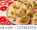 Dumplings, filled with mashed potatoes. 137483254