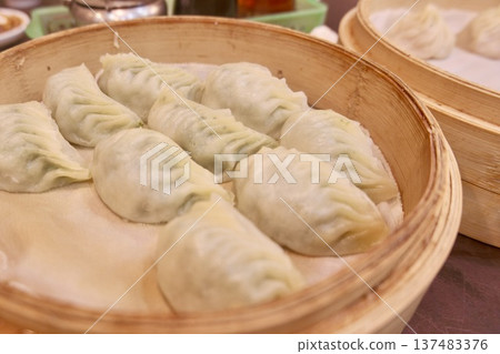 Xiaolongbao served at a Taiwanese restaurant Xiaolongbao served at a Taiwanese restaurant 137483376