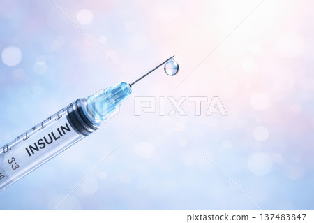 Insulin syringe needle droplet hormone concept medical glucose diabetes treatment healthcare injection drug sterile blue background macro precision control 137483847