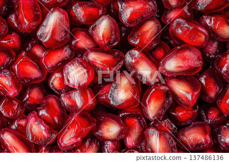 Close-Up of Fresh Pomegranate Seeds Densely Packed for Vibrant Food Photography Close-Up of Fresh Pomegranate Seeds Densely Packed for Vibrant Food Photography 137486136