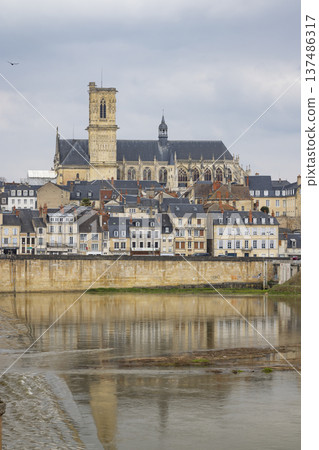 Nevers cathedral and city reflecting in river Loire Nevers cathedral and city reflecting in river Loire 137486317