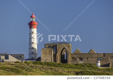 Pointe Saint Mathieu lighthouse illuminating Finistere coast in Brittany Pointe Saint Mathieu lighthouse illuminating Finistere coast in Brittany 137486330