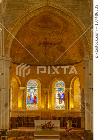 Church interior with stained glass leading worship in Avallon, Yonne, France Church interior with stained glass leading worship in Avallon, Yonne, France 137486535