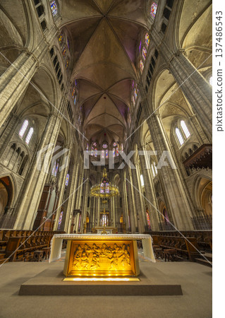 Bourges Cathedral interior showcasing Gothic architecture and altar Bourges Cathedral interior showcasing Gothic architecture and altar 137486543