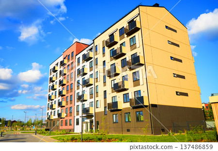 Residential condominium block building. New Modern complex of Apartment residential condo Residential condominium block building. New Modern complex of Apartment residential condo 137486859