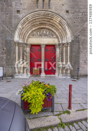 Saint Andoche Basilica entrance with red doors, Saulieu, France 137486989