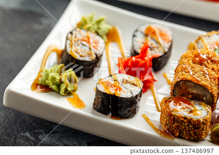 Sushi rolls with sesame and soy sauce Sushi rolls with sesame and soy sauce 137486997