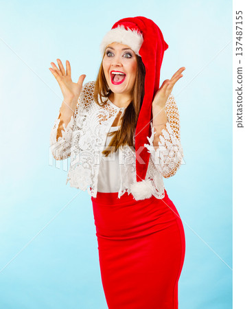 Shocked santa claus christmas woman 137487155