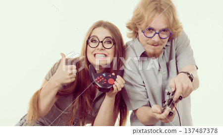 Gaming couple playing games 137487378