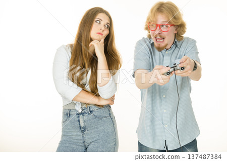 Woman is angry at playing man Woman is angry at playing man 137487384