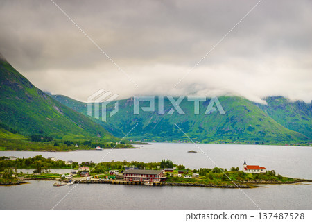 Fjord landscape with church. Lofoten Norway Fjord landscape with church. Lofoten Norway 137487528
