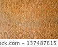 Abstract stone carving geometric floral pattern ancient temple wall texture bas relief detailed craft historic art background design architecture religion symbol weathered 137487615