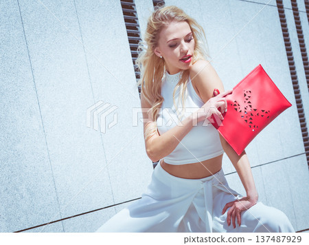 Fashion woman with red handbag Fashion woman with red handbag 137487929