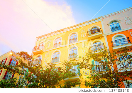 Buildings with colorful facades, balconies in european bright sunny day. Facade buildings 137488148
