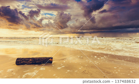 Beatiful sunset with clouds over sea and beach Beatiful sunset with clouds over sea and beach 137488632