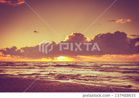 Beatiful sunset with clouds over the Baltic sea Beatiful sunset with clouds over the Baltic sea 137488635