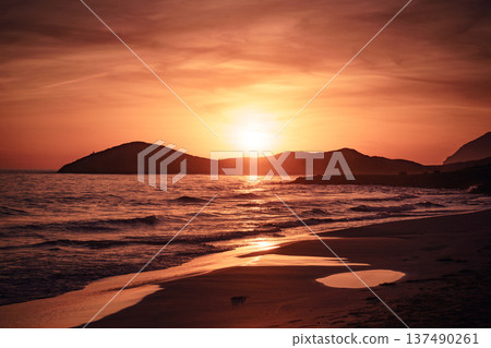 Sunset over sea, Calblanque beach, spain Sunset over sea, Calblanque beach, spain 137490261