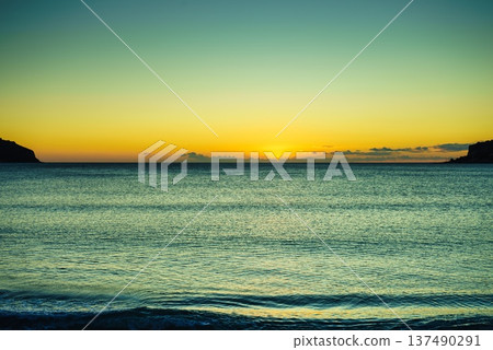 Sunset or sunrise over sea surface 137490291