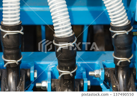Detailed closeup of flexible plastic hose Detailed closeup of flexible plastic hose 137490550