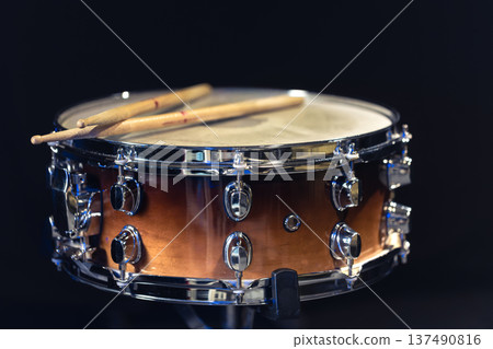 Drum close-up. Drumsticks with a drum. 137490816