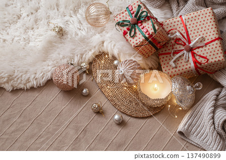 Composition from Christmas decorations. The concept of a cozy home and a Christmas atmosphere. Composition from Christmas decorations. The concept of a cozy home and a Christmas atmosphere. 137490899