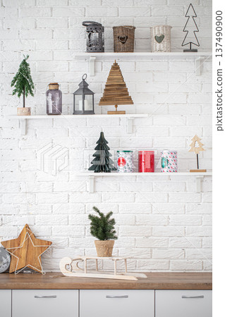 Decorative Christmas items in the interior of a modern kitchen. Decorative Christmas items in the interior of a modern kitchen. 137490900