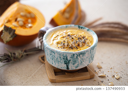 Appetizing composition with pumpkin soup close up. 137490933