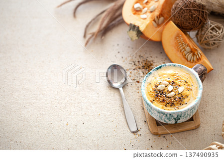 Appetizing composition with pumpkin soup copy space. 137490935