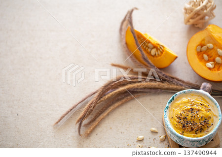 Appetizing composition with pumpkin soup copy space. 137490944