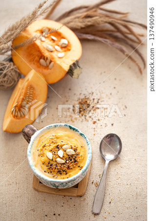 Appetizing composition with pumpkin soup top view. 137490946