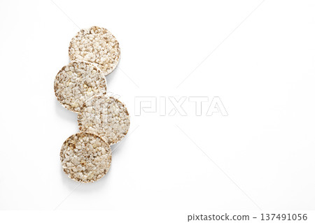 Creative layout made of rice cakes on the white background. Creative layout made of rice cakes on the white background. 137491056