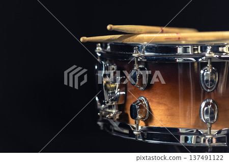 Drum close-up. Drumsticks with a drum. 137491122