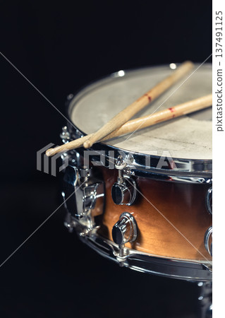 Drum close-up. Drumsticks with a drum. Drum close-up. Drumsticks with a drum. 137491125