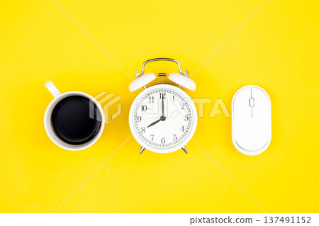 Cup of coffee, alarm clock and computer mouse on yellow background, flat lay. Cup of coffee, alarm clock and computer mouse on yellow background, flat lay. 137491152