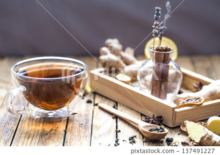 still life with a cup of tea on a wooden background 137491227