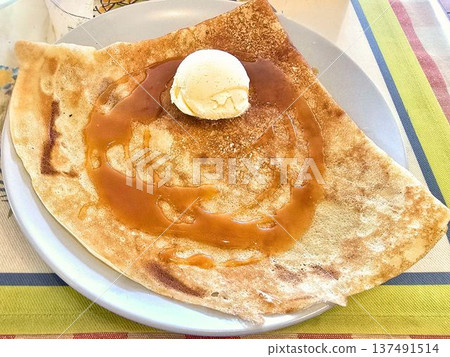Buckwheat galette topped with ice cream 137491514