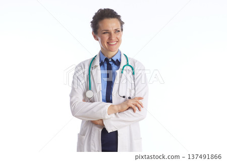 Friendly Medical Professional Looking Aside with Crossed Arms Friendly Medical Professional Looking Aside with Crossed Arms 137491866