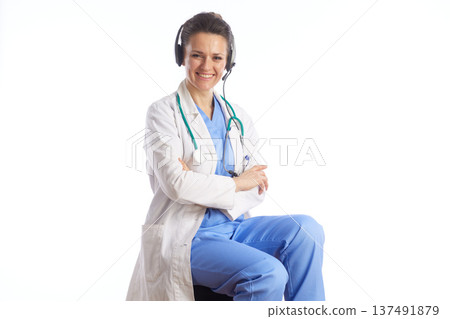 Confident Female Doctor with Headset and Crossed Arms 137491879