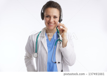 Female Healthcare Professional Adjusting Telehealth Headset Female Healthcare Professional Adjusting Telehealth Headset 137491881